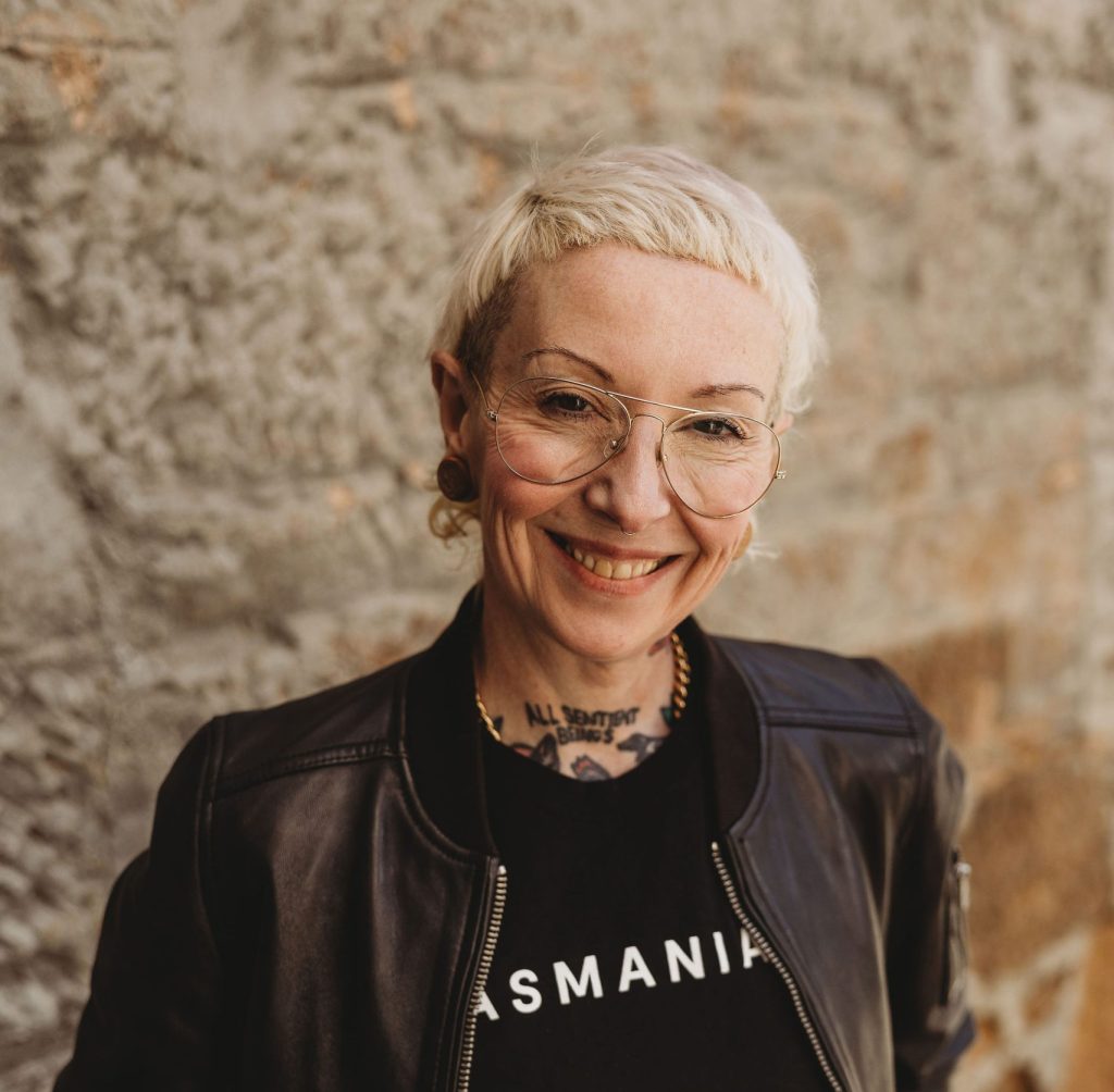 Image of Dr Polly McGee. Polly is facing the camera and smiling