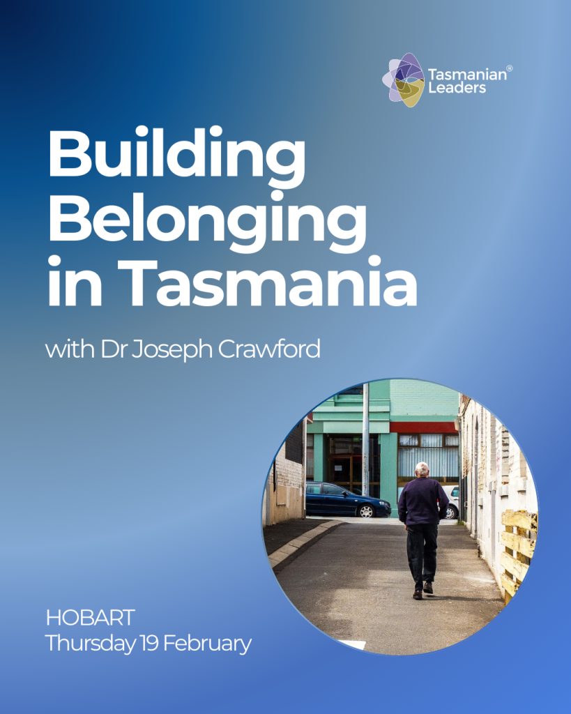 Hero title building belonging in Tasmania with a small image in a round frame of a man walking up a laneway, back to the viewer